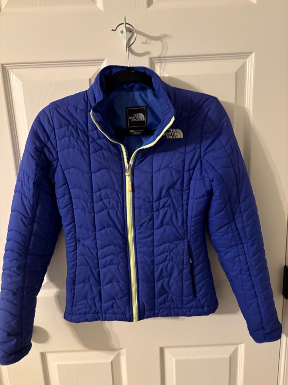 The North Face Quilted Jacket in Blue with Yellow Trim